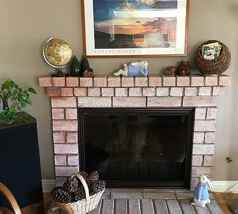 Lovely fireplace with high end gas logs
