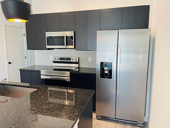 Stainless steel appliances and granite countertop