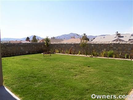 Large and lush grassy backyard maintained w/ sprinkler system!