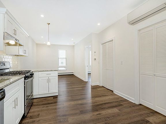 Granite countertops and subway tile backsplash