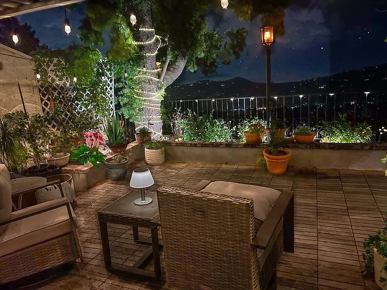 View of our patio and Los Angeles fom our living room at night.