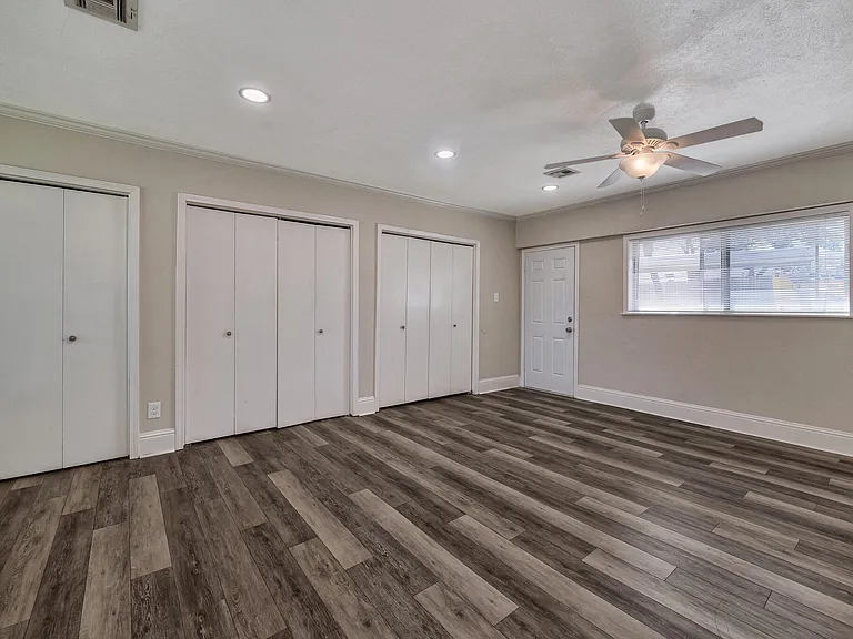 This room could be used as the master bedroom or den. Plenty of closet space
