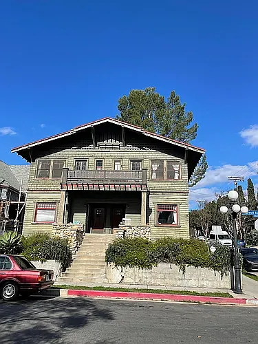 Front of house. Upper left unit.