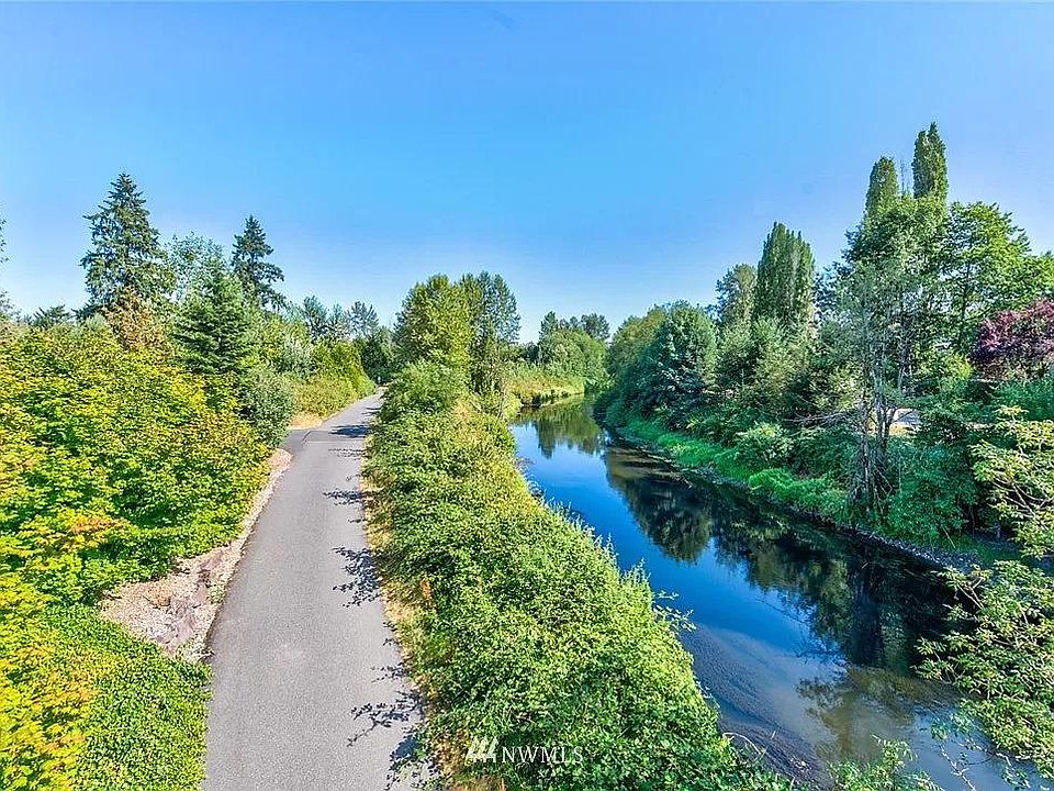 Located right next to the beautiful Sammamish River (behind the trees on the right)