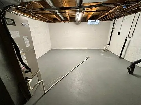 Utility and storage basement, with washer dryer hookups