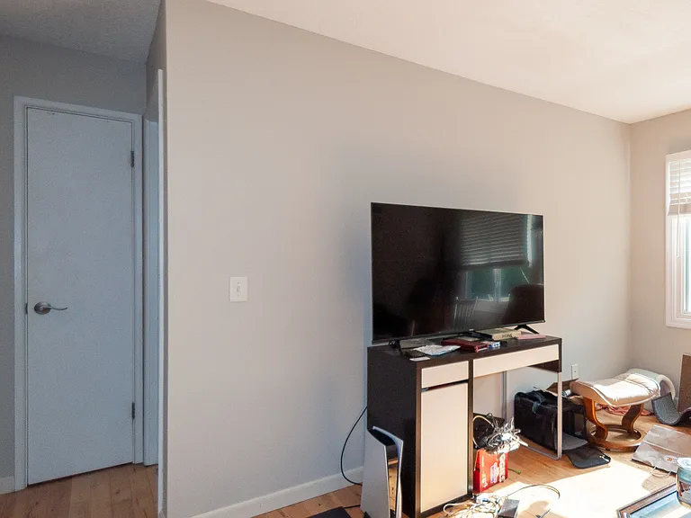 Living room is now painted gray.