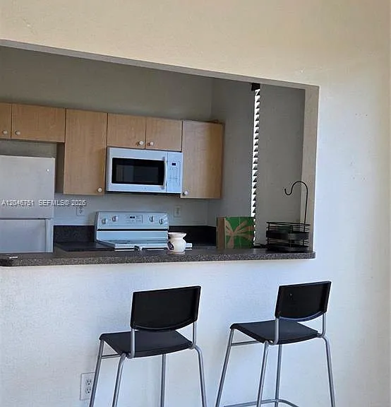 10957 SW 237th Ter #10957 — Photo 2