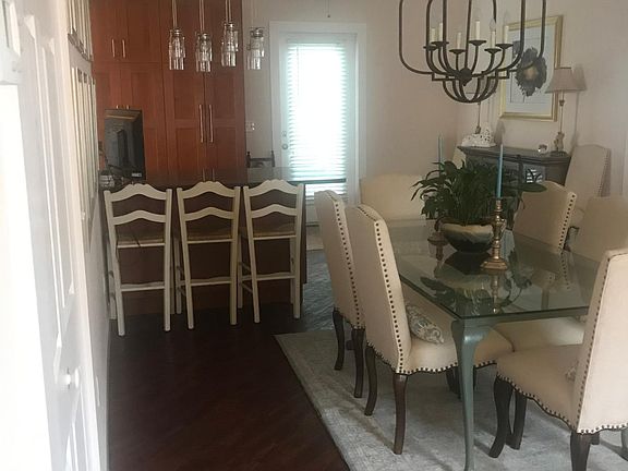 Eating area with kitchen in background
