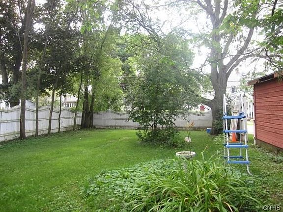 The 2-car garage is on the right and this privacy fence reaches around to the area just pictured.  So much space!
