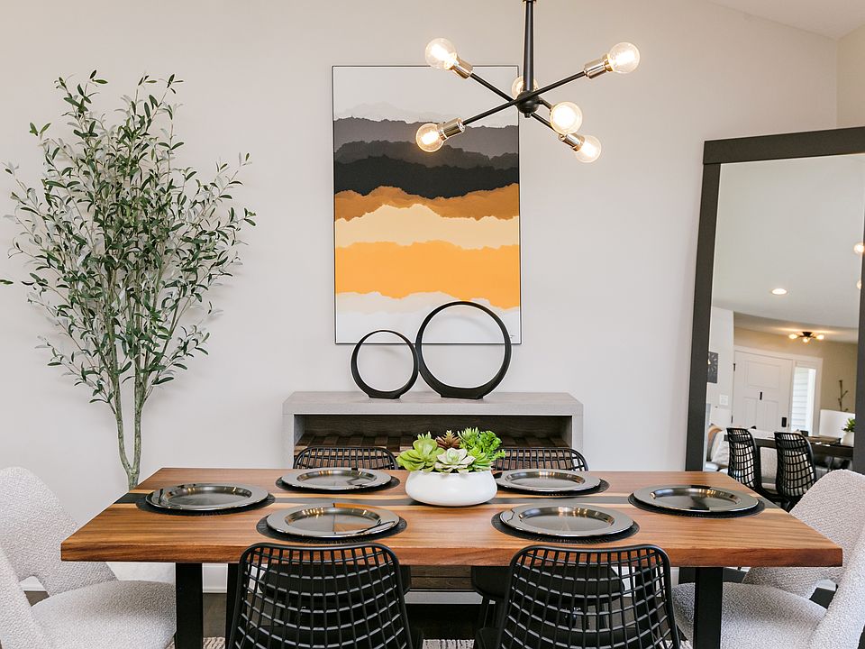A beautifully modern and functional dining space with formal seating for 6 and easy access to the bar cart.