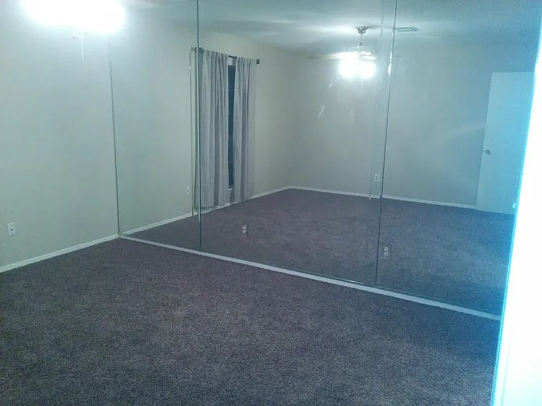 Master Bedroom with full length mirrors