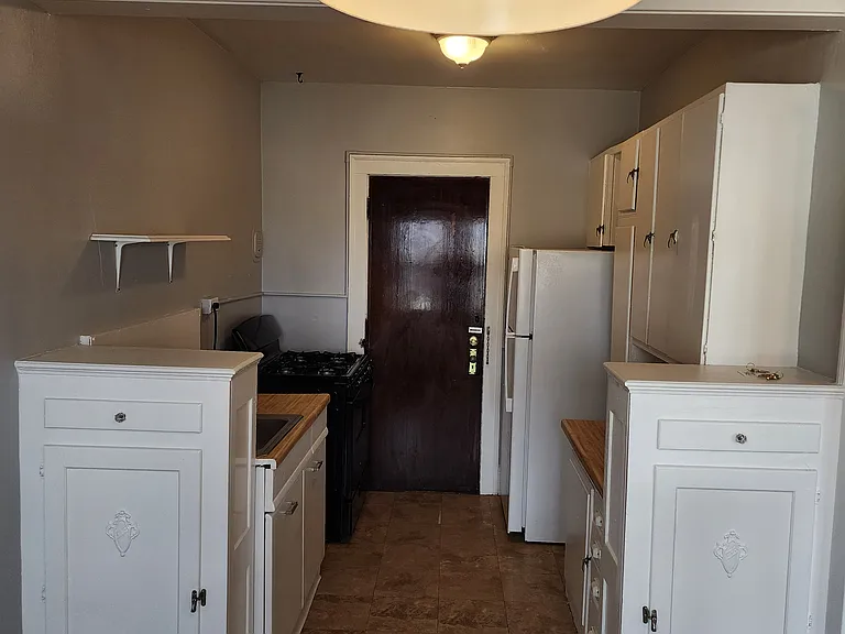Kitchen prep area from breakfast nook