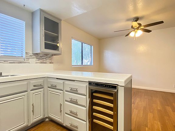 Built-in wine refrigerator for easy access to your favorite chilled beverages.