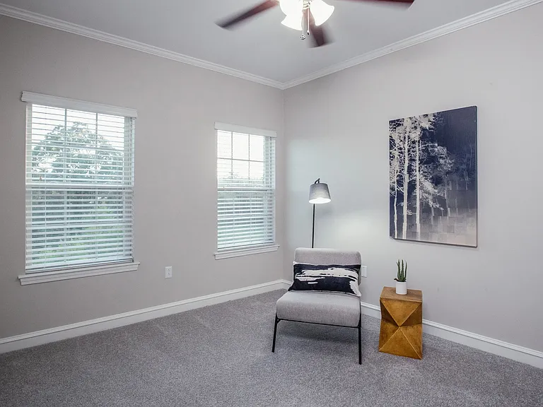 Retreat to cozy bedrooms with charming comforts for peaceful slumber.