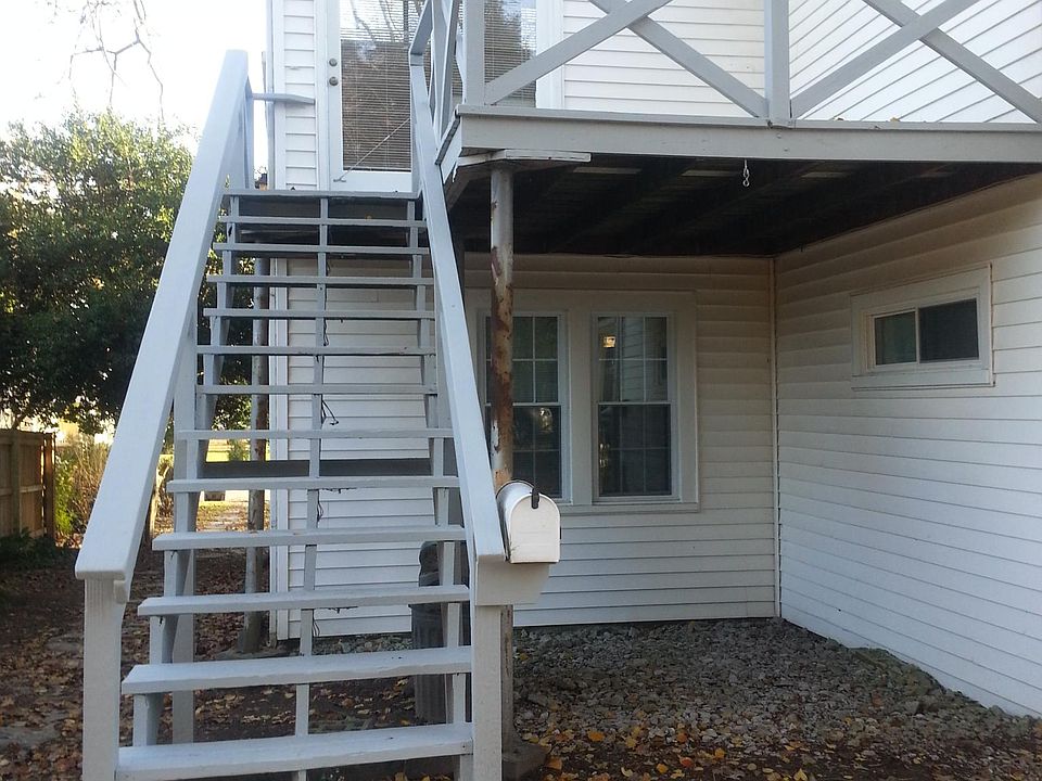 Front porch and entry. A great place for your grill!