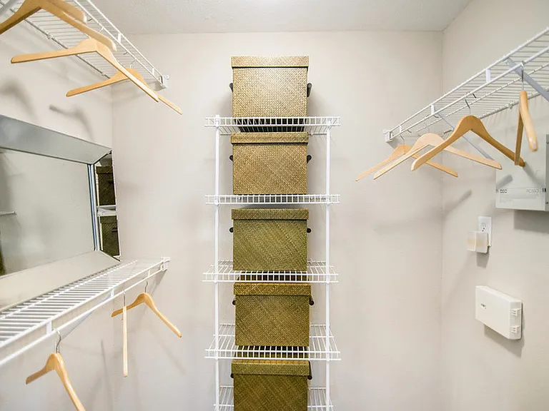 Large Walk-in Closet with Built-in Shelves