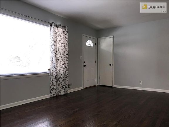 Another Look Of The Front Living Room, Front Door and Coat Closet.