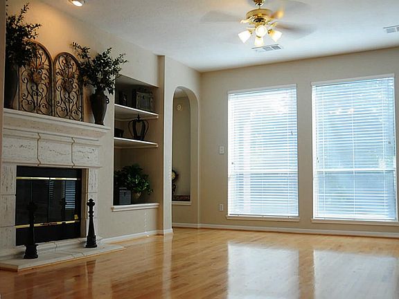 Large open family room with Gas fireplace, perfect for entertaining loved ones!