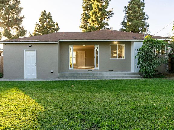 Large rear porch. Direct access to attached garage from rear yard.