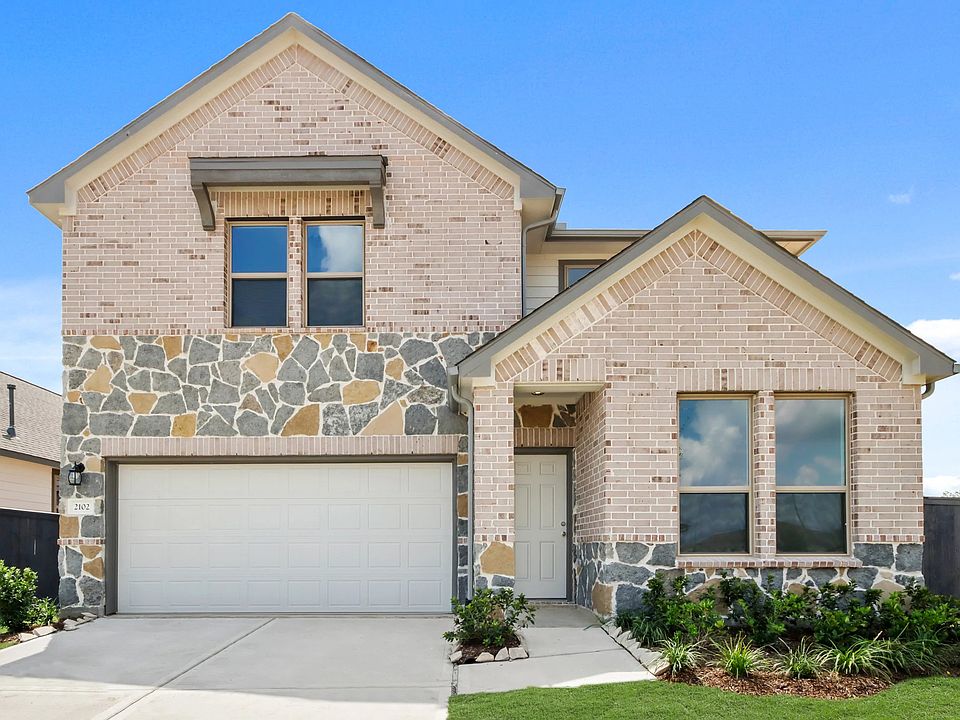 Welcome home to 2102 Birch Brook Lane located in the community of Cedar Pointe and zoned to Crosby I