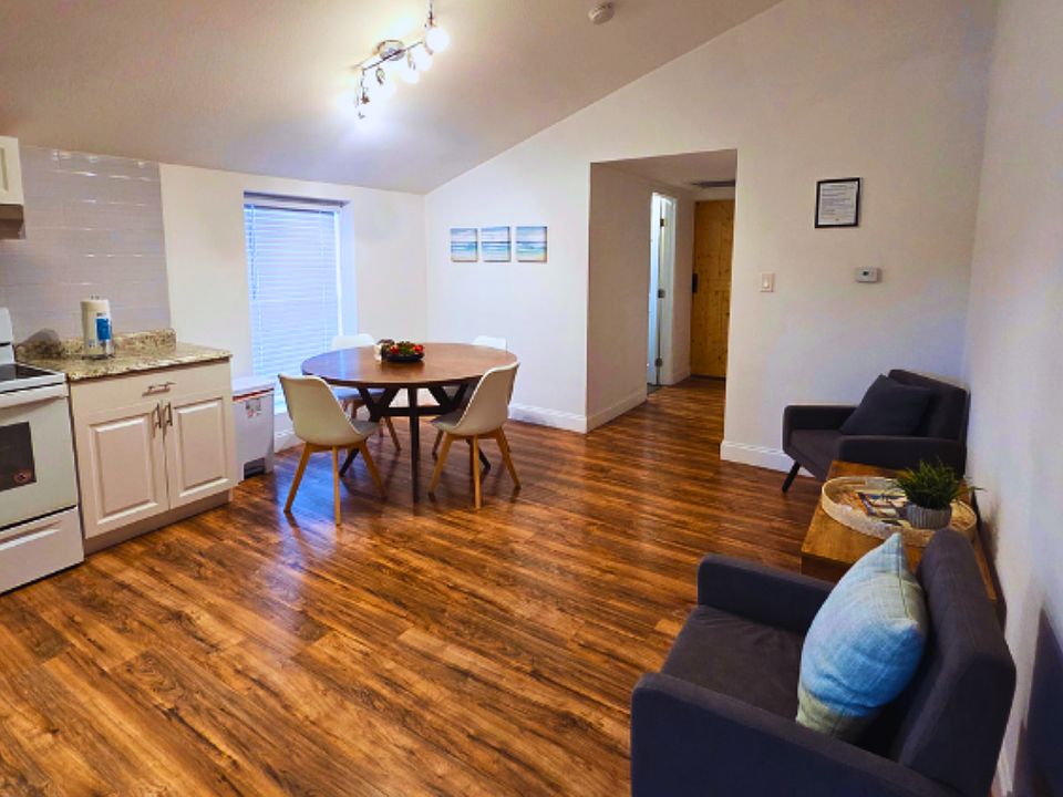 Cozy furnished apartment with kitchen, living room, bathroom & essential amenities.