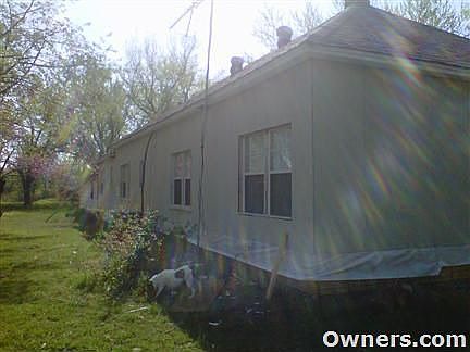 back side of house during siding installation