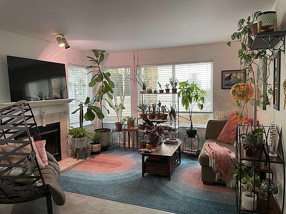 Spacious living area includes fireplace