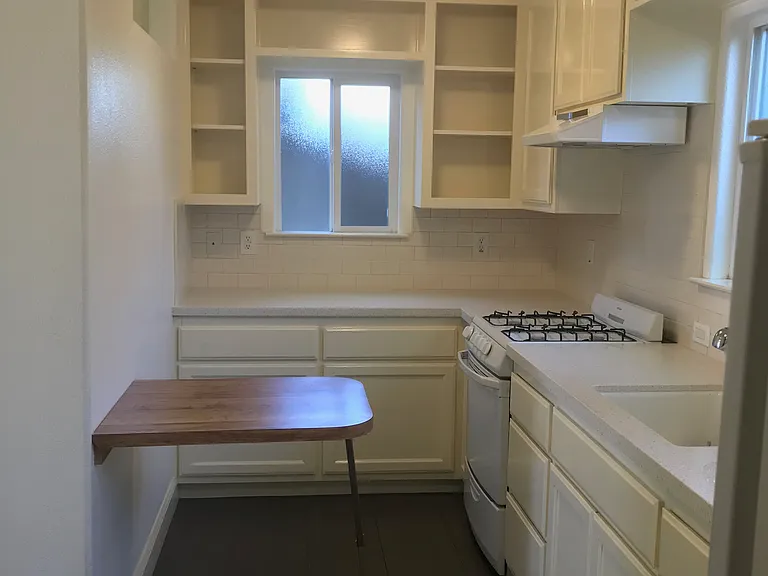 Kitchen with fold down table.