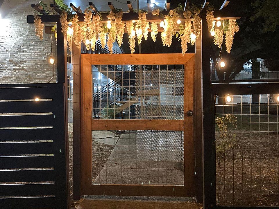 Welcome home to a well lit, completely gated courtyard.