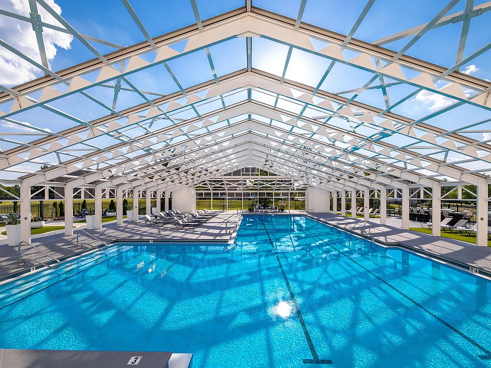 Dive into relaxation in our stunning, enclosed pool. Enjoy a swim or lounge by the water, all while basking in the natural light and beautiful surroundings.