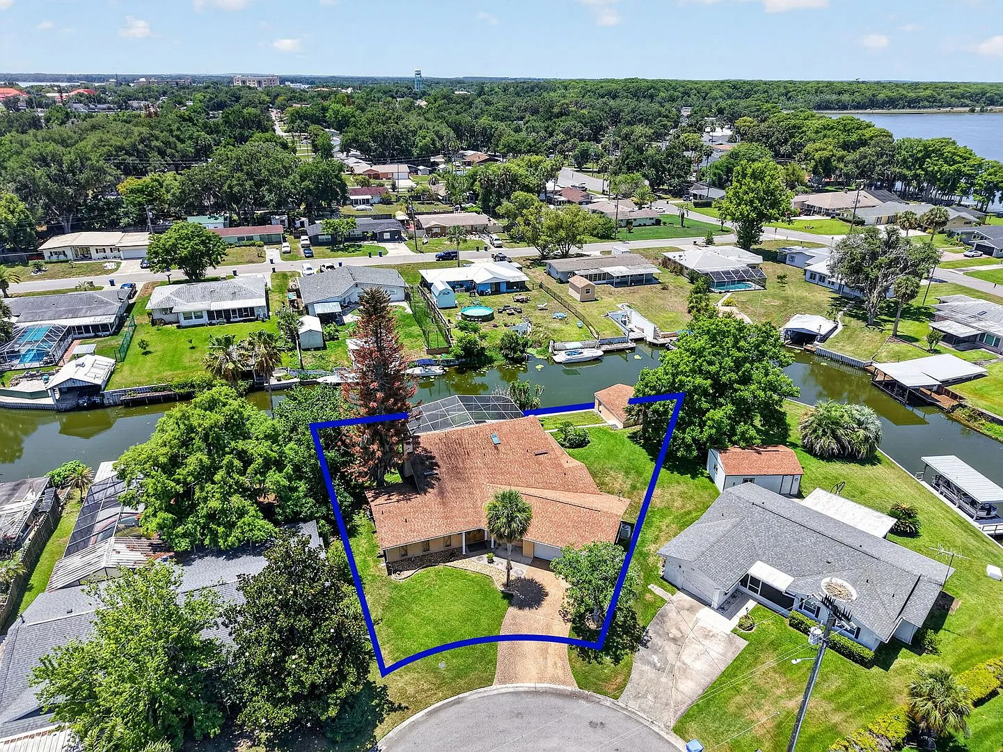 Available Now! Unique Canal-Front Pool Home with Boathouse & Chain of Lakes Access — Photo 2