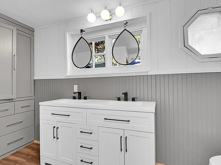 bathroom with washer and drying to come