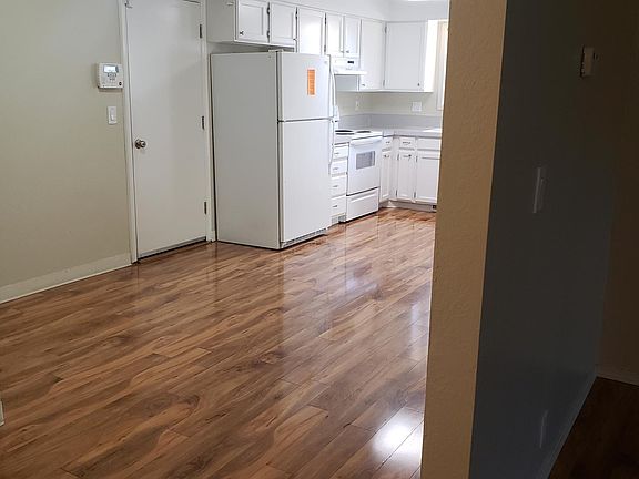 Front door on far left, den on far right