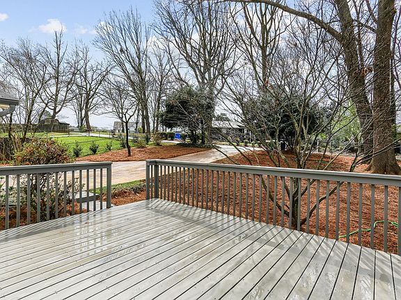Deck area the main entrance to the home on a quiet street