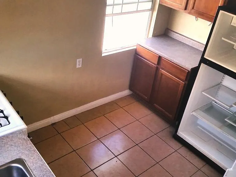 Kitchen with Fridge and Stove