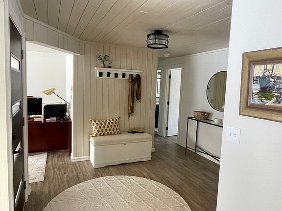 Entry way inside front door, looking from the living room. Not pictures is coat closet.
