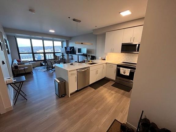 View from Front Door to Kitchen and Living Room. **Only Unit for Sublet. Furniture & Furnishings are not included.