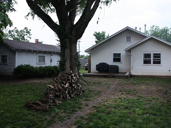 Large backyard (wood from cutting down tree limbs from ice storm)