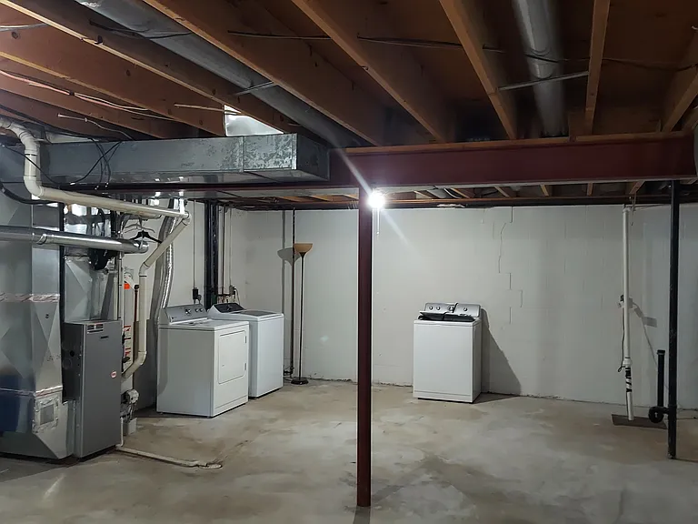 Washer/Dryer and Plenty of Storage or use as a Game Room.