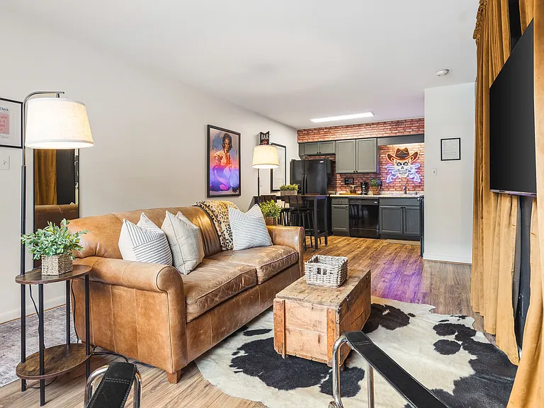 Cozy living room with a smart TV and a sleeper sofa. No stairs in this condo and located on the ground level, for easy access.