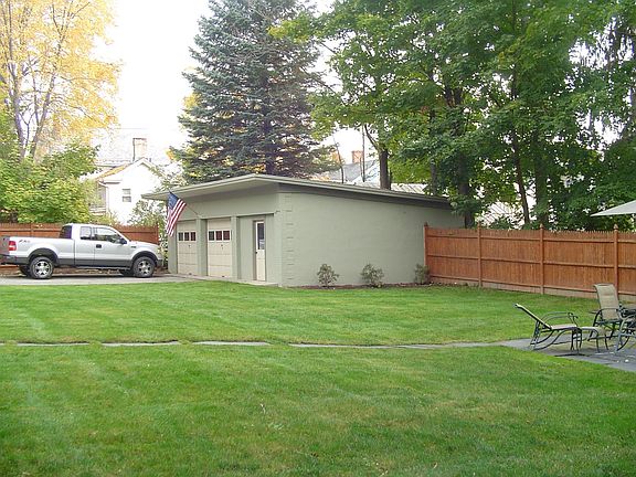Large level yard 2 car detached garage