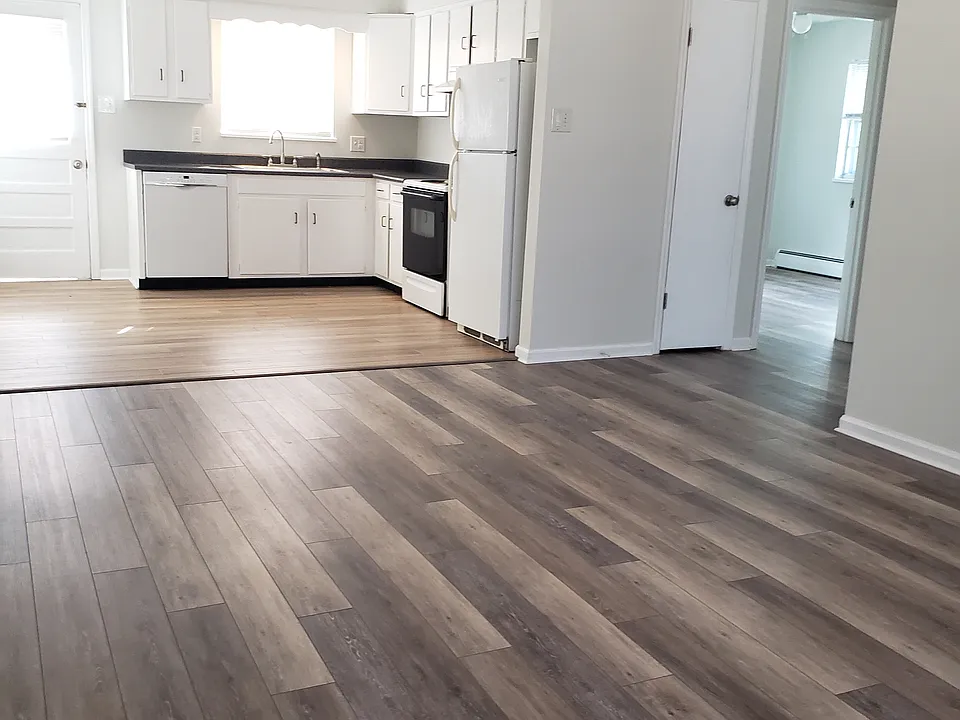 View from front entrance of kitchen and hall to bedrooms
