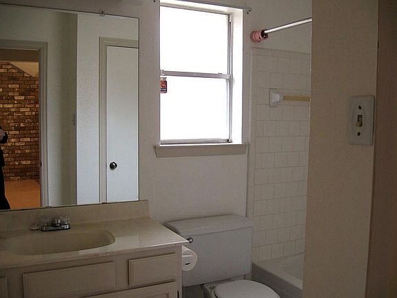 Hall bath with linen closet.