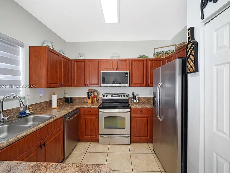 8897 SW 225th St — Photo 11