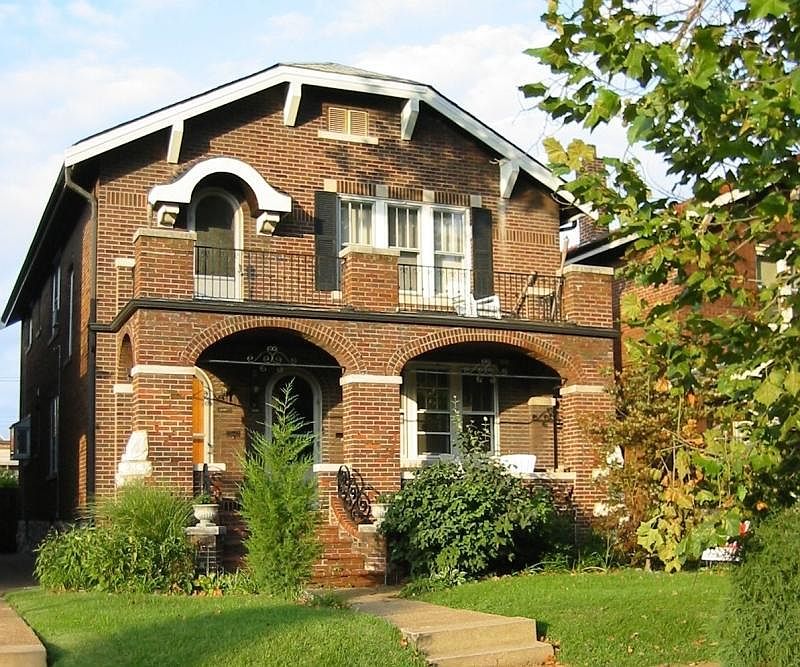 Front of house, showing large balcony