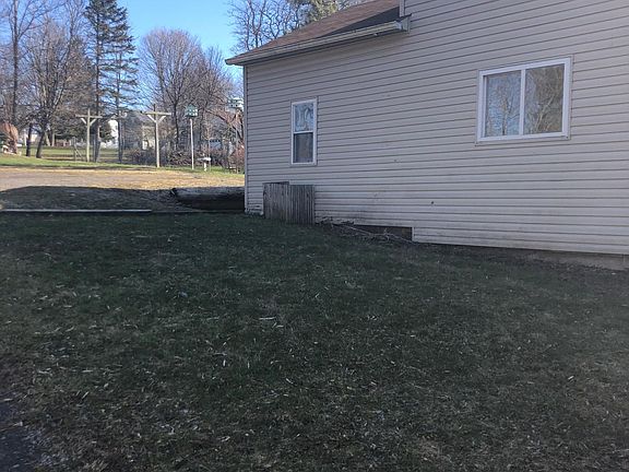 Small side yard and view into the back.