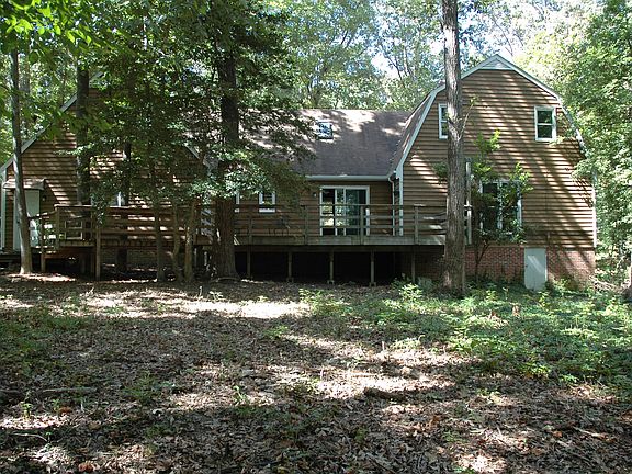 Wooded back yard with plenty of shade