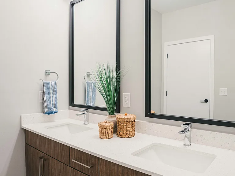 Indulge in luxury living with homes featuring designer bathrooms, complete with double vanities and quartz countertops.
