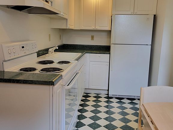 What an adorable kitchen! Table not included.