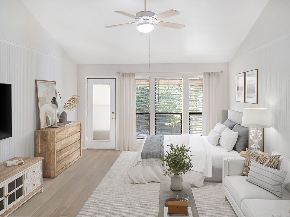 Studio style apartment offers plenty of space for living with multiple furniture arrangements.